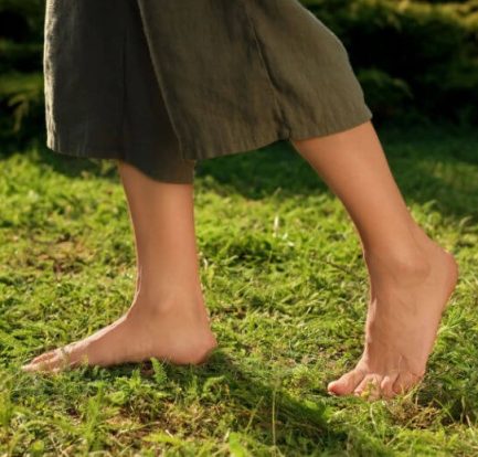 walking barefoot on grass