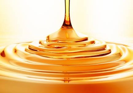 poring honey